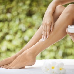 Beautiful Woman Legs And Cream.